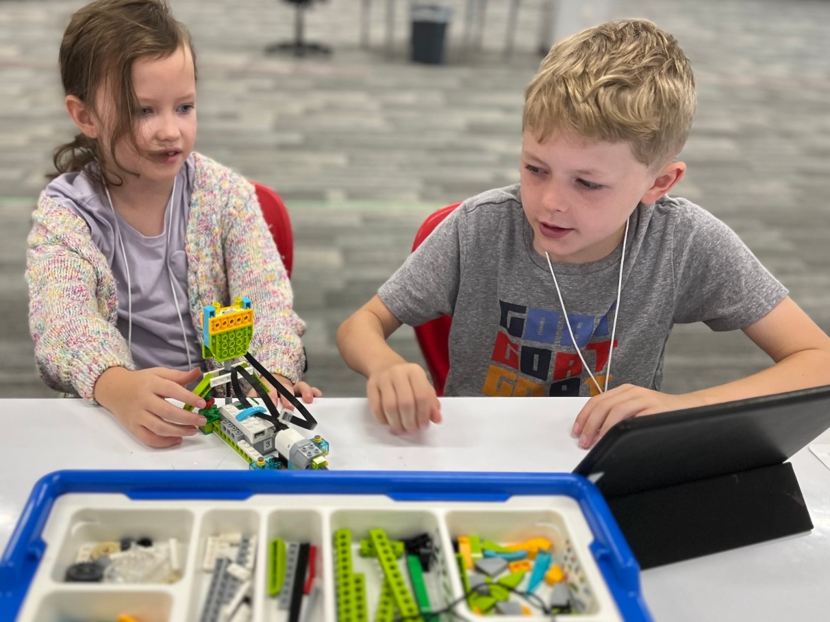 Robots to the Rescue Camp Young kids using elementary programming software to build and code a moving LEGO robot