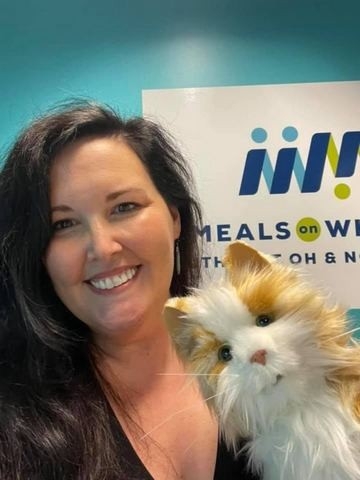 Jennifer Steele with cat puppet