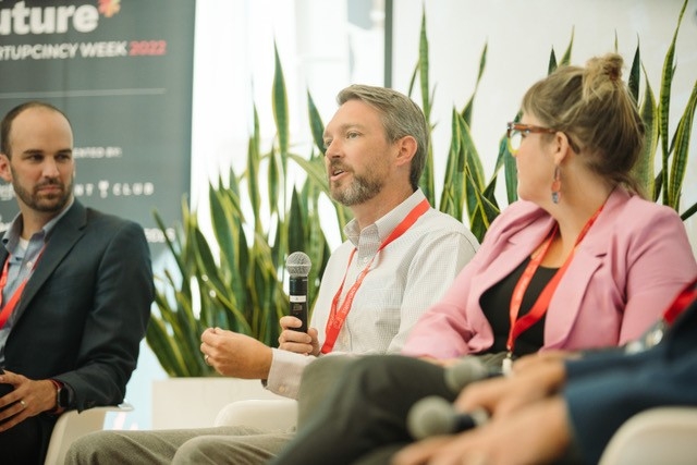 Dr. Salzman sitting on panel