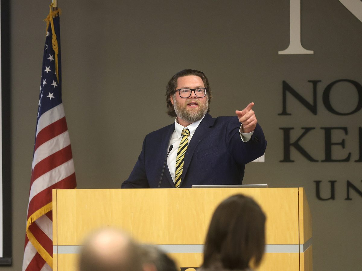 Darrin Wilson speaking at podium