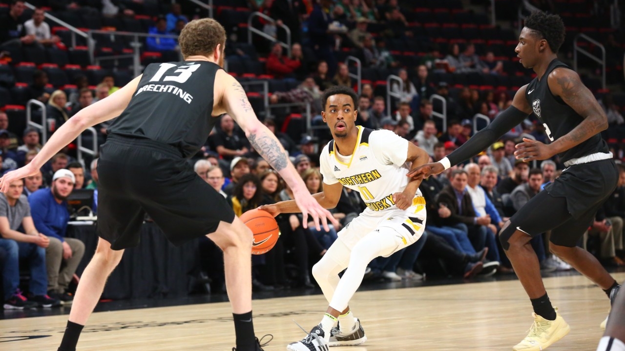 A NKU Norse basketball player during a game