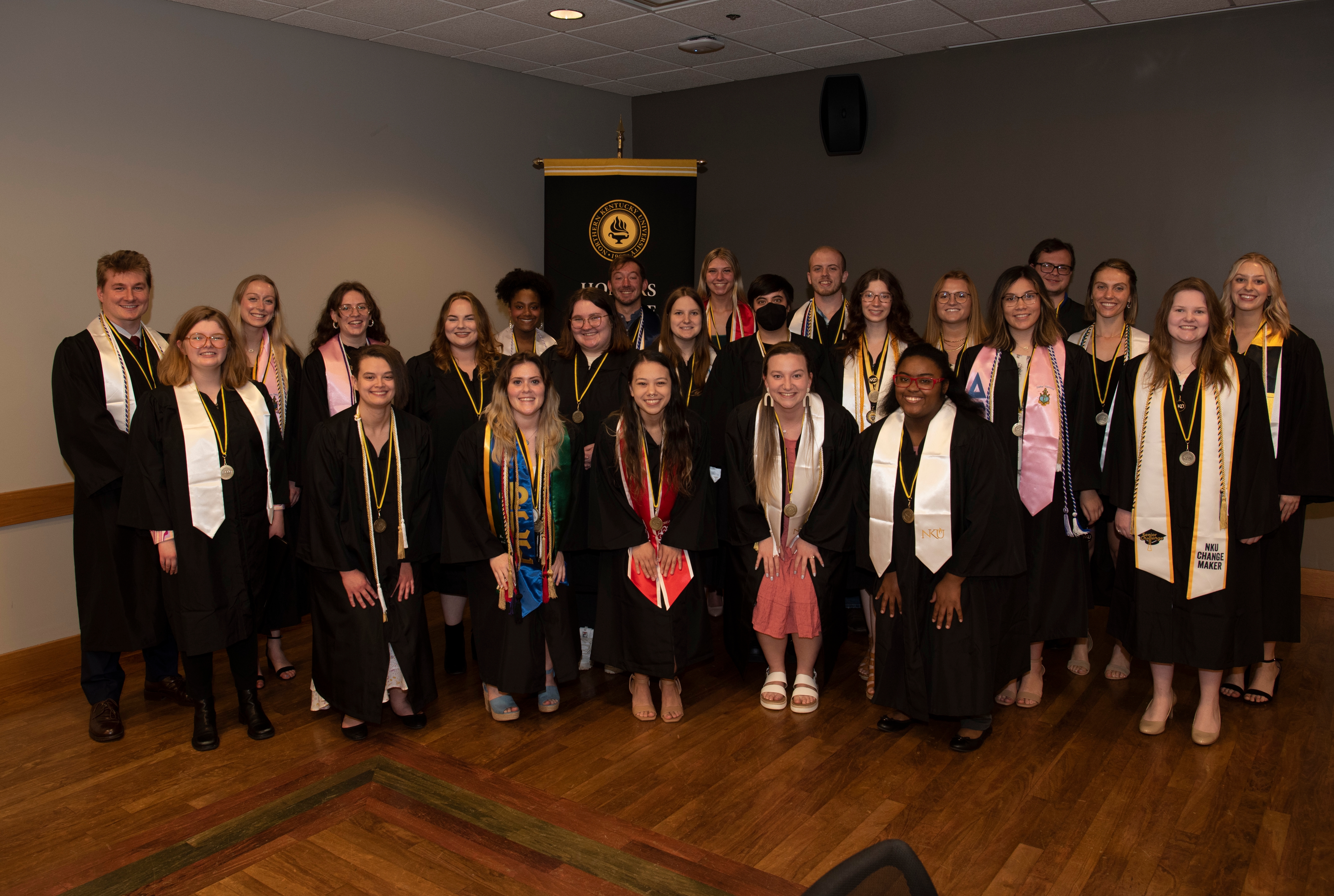 honors students after graduation ceremont